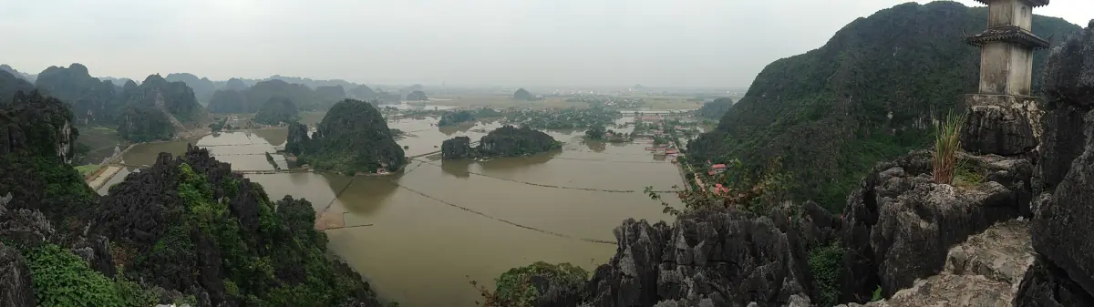Mist hanging over karst islands and water from a mountain top